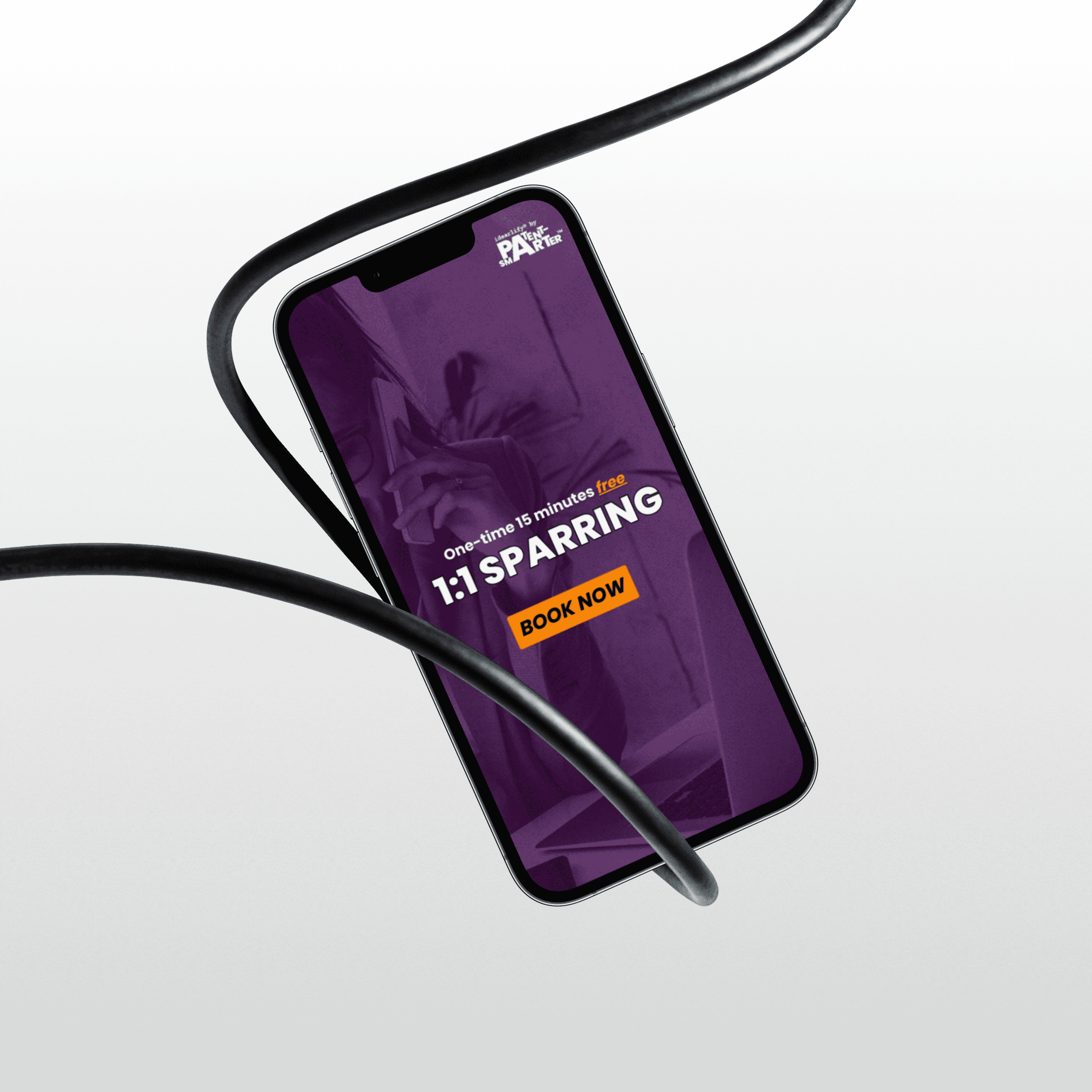 Iphone 13 pro hanging in a black wire, the iphone shows a purple background, patentsmarter™ and idearlify® logo and the heading "1:1 sparring" "book now" pointing towards the one-time 15-minute free 1:1 sparring session